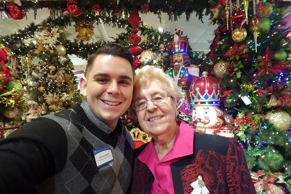 A resident and staff member taking a photo at Merrill Gardens at Green Valley Ranch in Henderson, Nevada. 