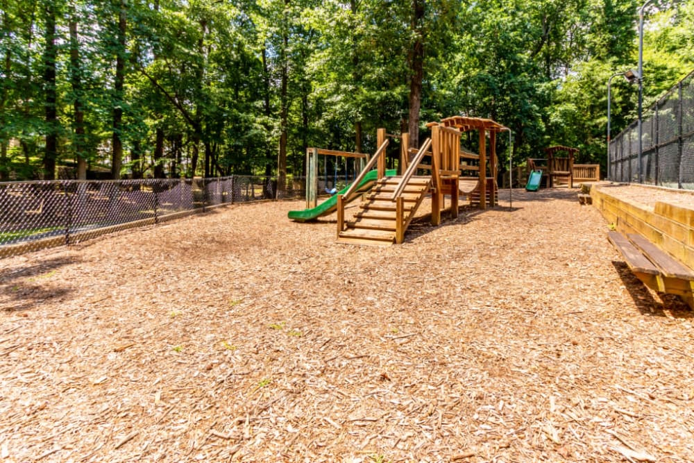 Enclosed children's playground area at Marquis at Sugarloaf in Duluth, Georgia