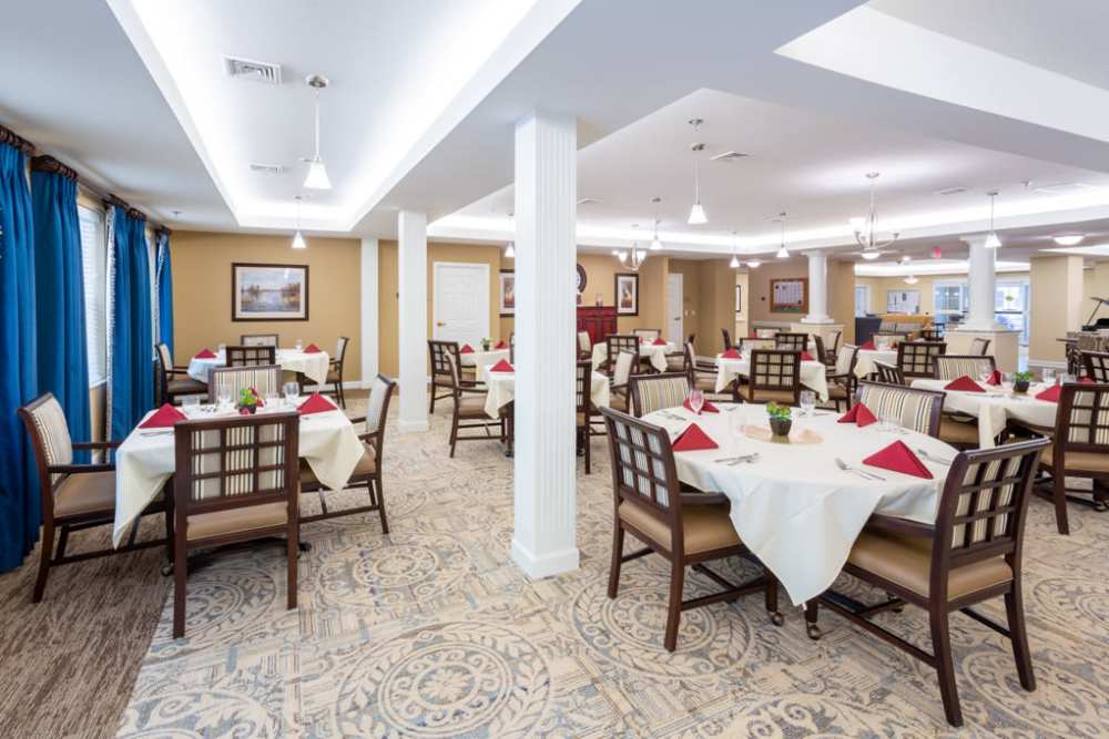 Well lit and spacious dining room at The Harmony Collection at Roanoke - Assisted Living in Roanoke, Virginia