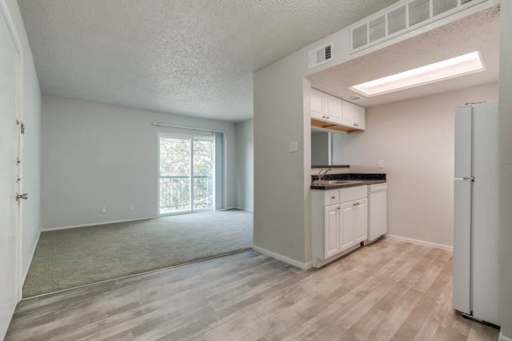 Dining and living area at Woodland Apartments San Antonio in San Antonio, Texas