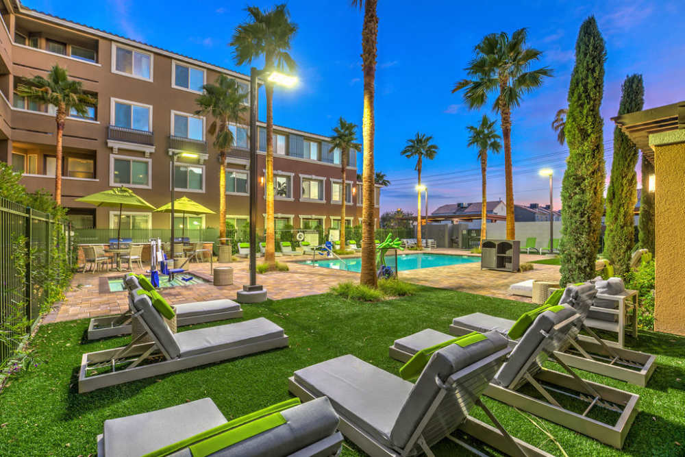 Relaxing chairs with pool at Harmony in Las Vegas, Nevada