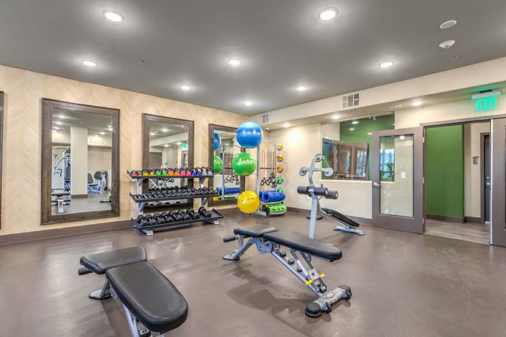 Fitness center with attached mirros at Harmony in Las Vegas, Nevada 