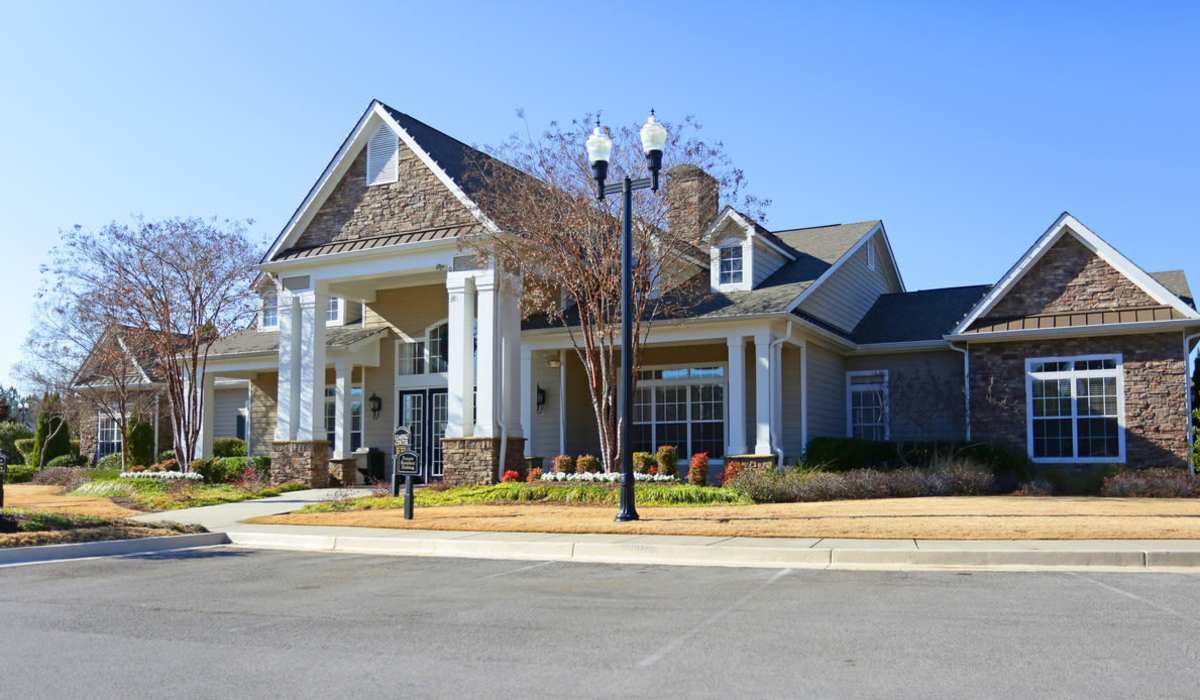 Scenic exterior view of a lively community clubhouse at Madison Park in Madison, Alabama