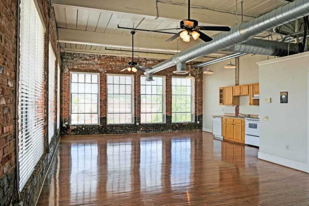 spacious interior with large windows at Broadway Lofts in Macon, Georgia