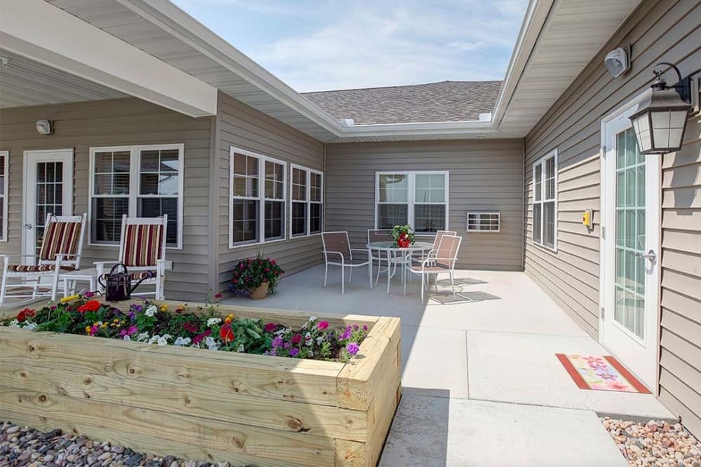 Exterior of patio and seating at Milestone Senior Living Hillsboro in Hillsboro, Wisconsin.