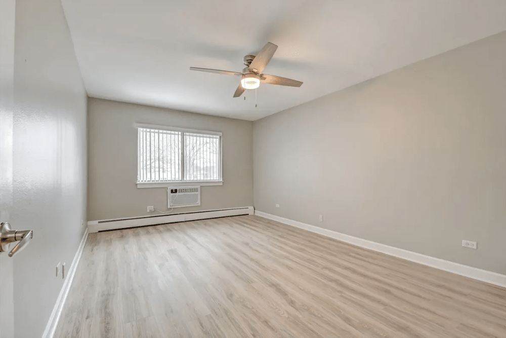 Unfurnished bedroom at Terraces of Elk Grove in Elk Grove Village, Illinois