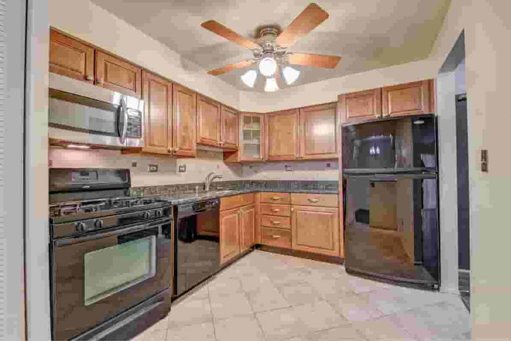 Fully equipped kitchen with appliances at Stonebridge in Arlington Heights, Illinois