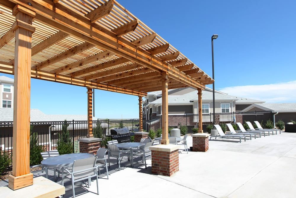 Barbecue area by the pool at Outlook Ridge in Pueblo, Colorado