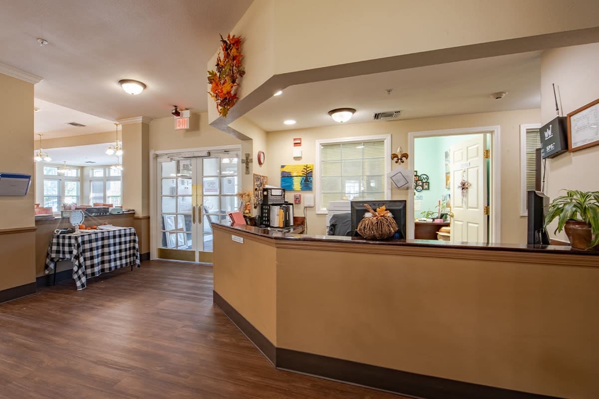 Entry foyer and front desk at Trustwell Living at Bailey Place in Bunkie, Louisiana