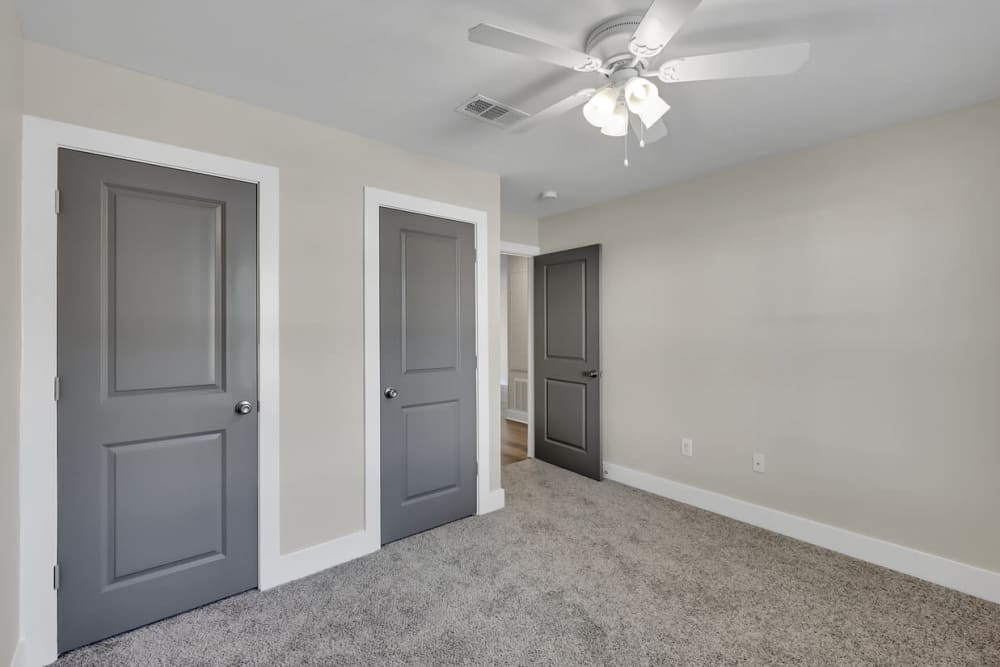 Bedroom with carpet flooring and ceiling fan at Woodforest Chase in Houston, Texas