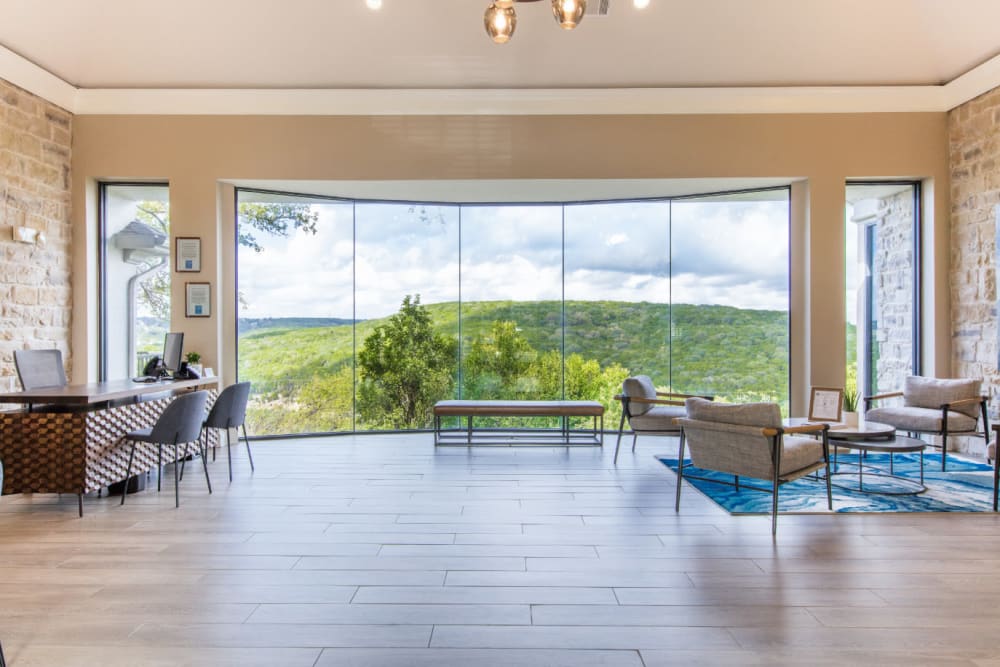 Inviting lobby with scenic view at Marquis at Treetops in Austin, Texas