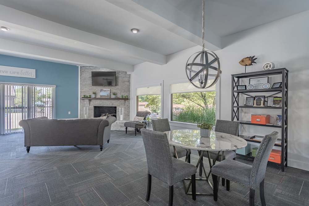 Clubhouse with lots of seating area at Millcroft Apartments & Townhomes in Milford, Ohio