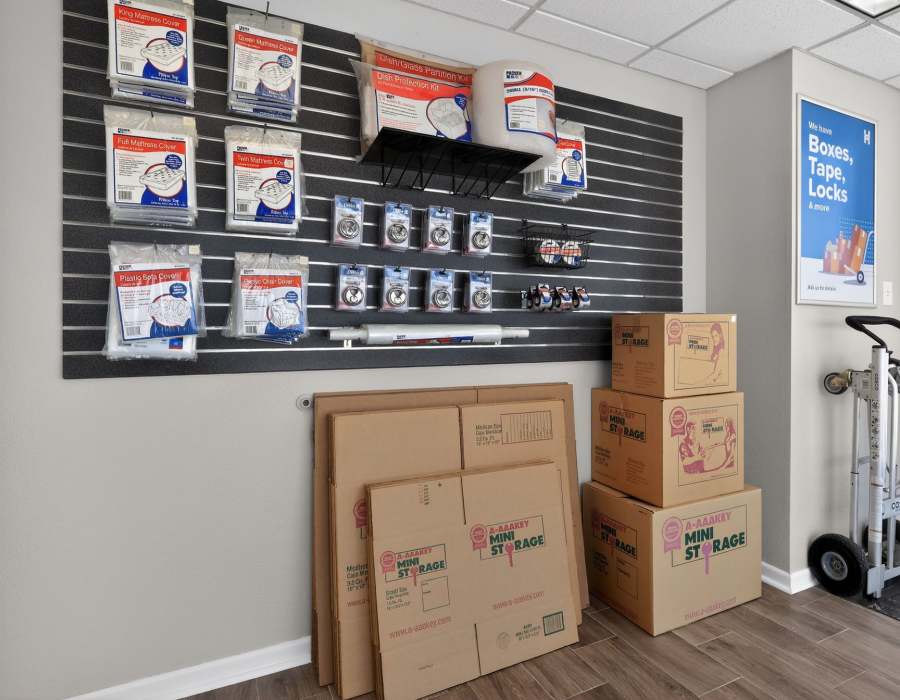 Home improvement supplies on display wall with assorted packaging materials at Storage Hub - Grissom in San Antonio, Texas