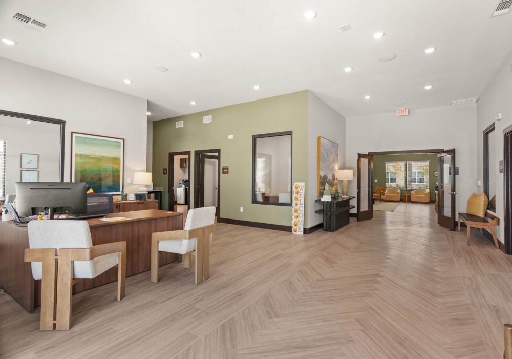 Resident clubhouse with lounge seating at Walnut Springs in Seguin, Texas