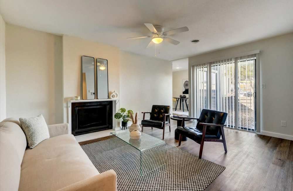 Living room with fire place at The Alista Apartments in Dallas, Texas, 