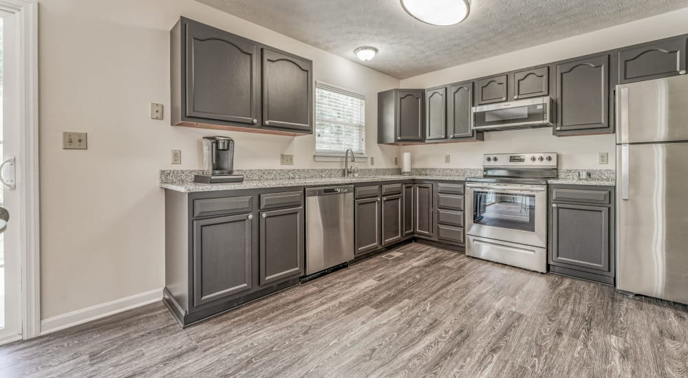 A kitchen with stainless-steel appliances at Walton Crossings in Jeannette, Pennsylvania