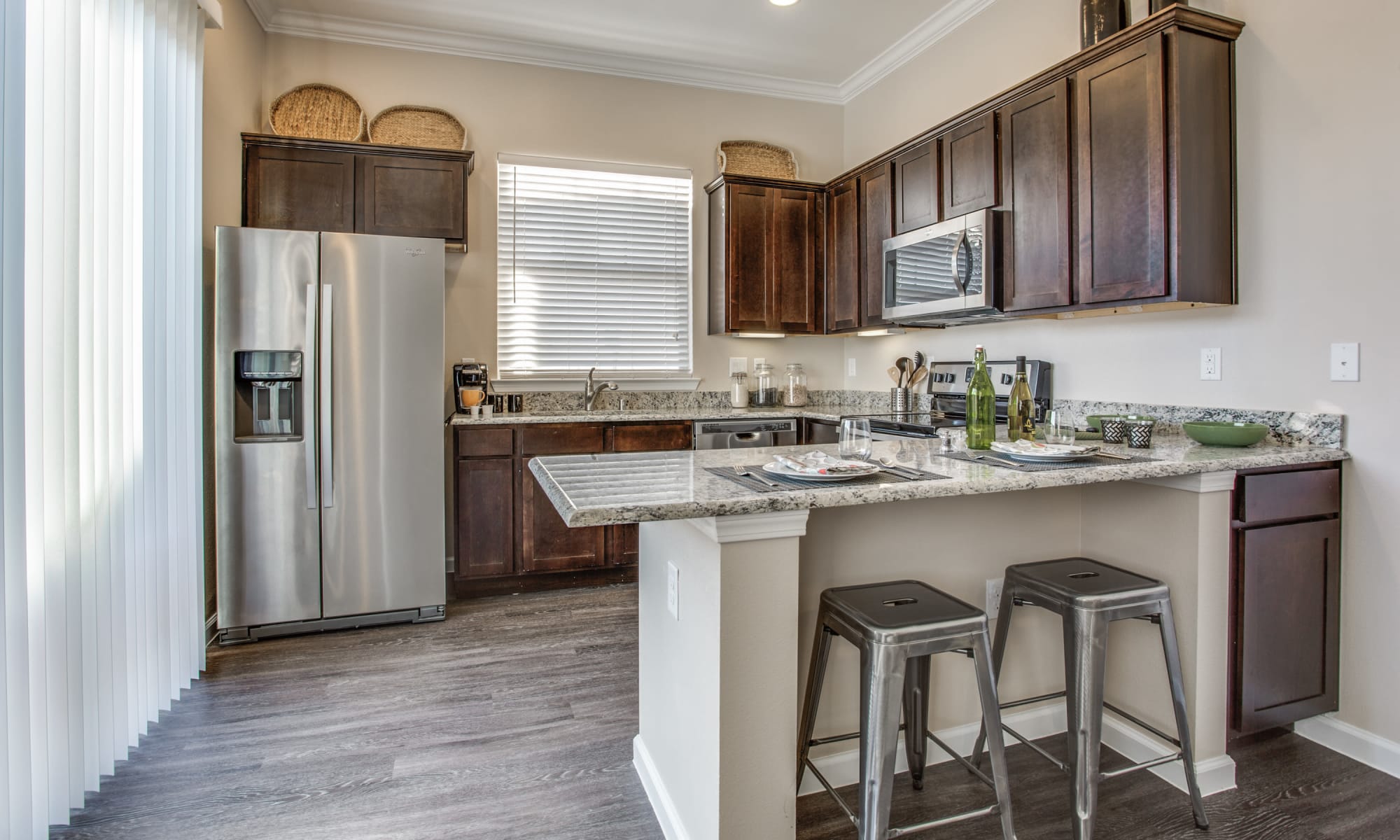 Stainless steel appliances in the kitchen at Avilla Prairie Center in Brighton, Colorado