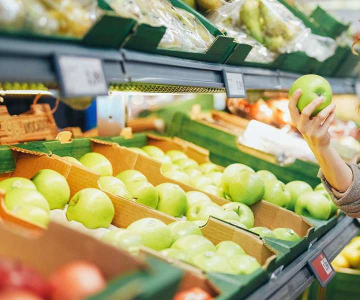Resident shopping fruits from supermarket near Alamitos on 4th in Long Beach, California 