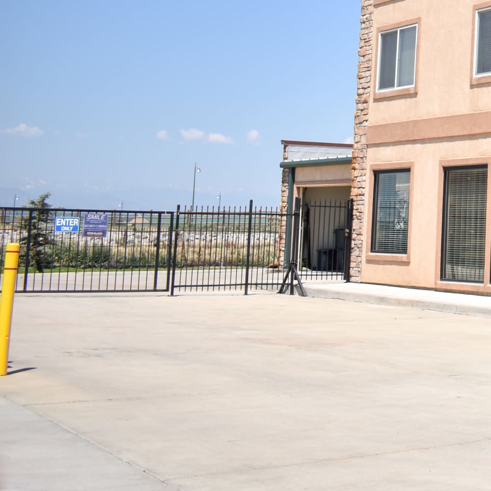 The secure front gate at STOR-N-LOCK Self Storage in Henderson, Colorado