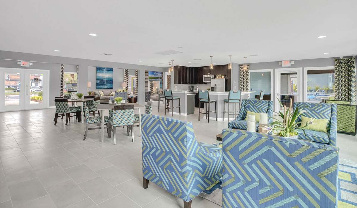 Large resident clubhouse with trendy seating at Lakeside Central Apartments in Brandon, Florida