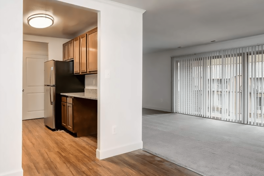 Kitchen and spacious living room at Rolling Park Apartments in Windsor Mill, Maryland