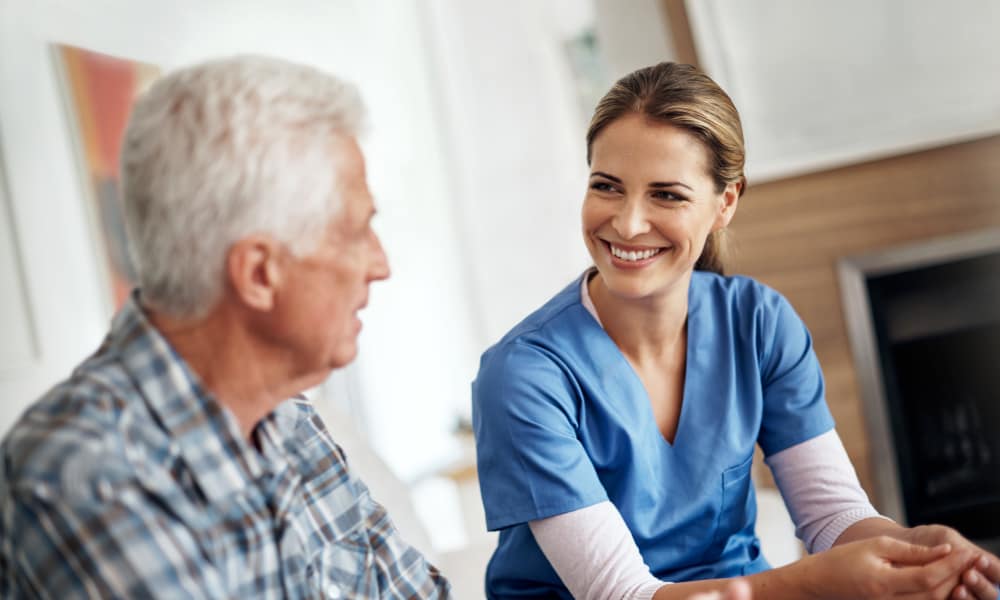 A resident and a CNA talking about financial options