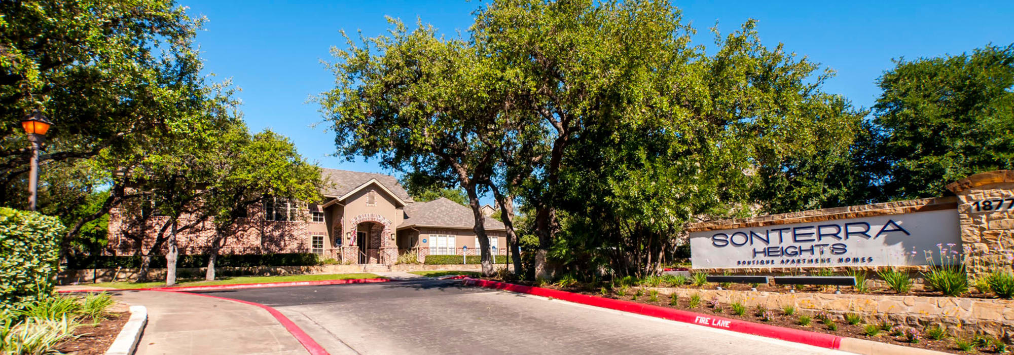 Monument sign at our community's entrance welcoming residents and guests to Sonterra Heights in San Antonio, Texas