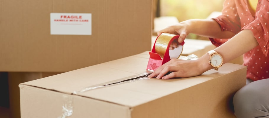 Box getting taped shut at A-1 Self Storage in Chula Vista, California