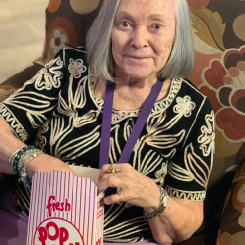 Resident eating popcorn at FountainBrook in Midwest City, Oklahoma