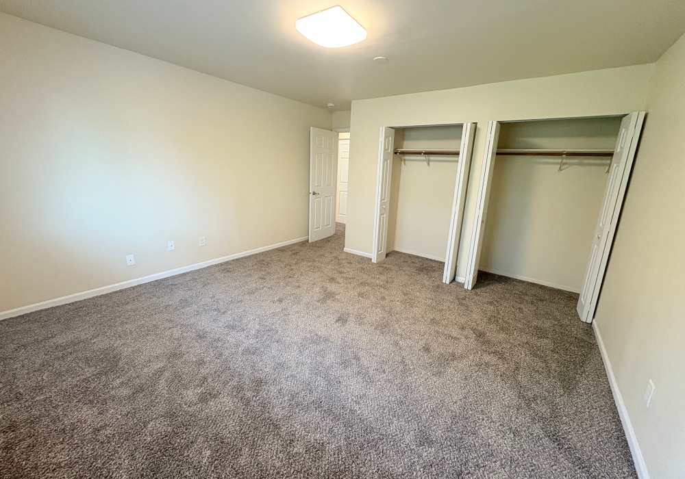 Apartment bedroom with walk-in closet at Edgewood Group Apartments in Merrillville, Indiana
