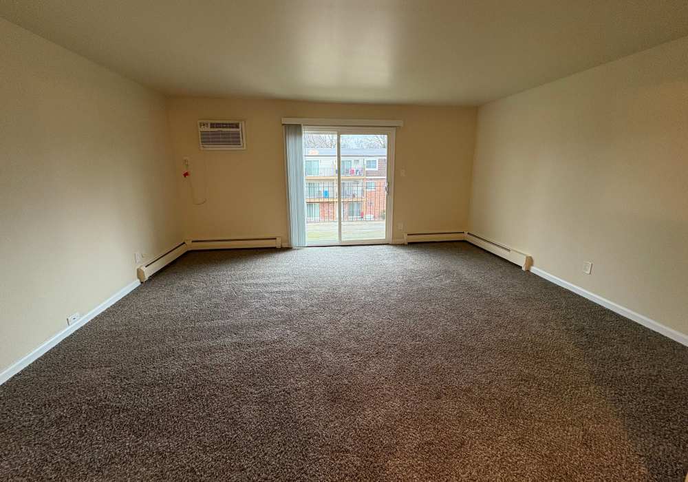 Spacious living room at Edgewood Group Apartments in Merrillville, Indiana