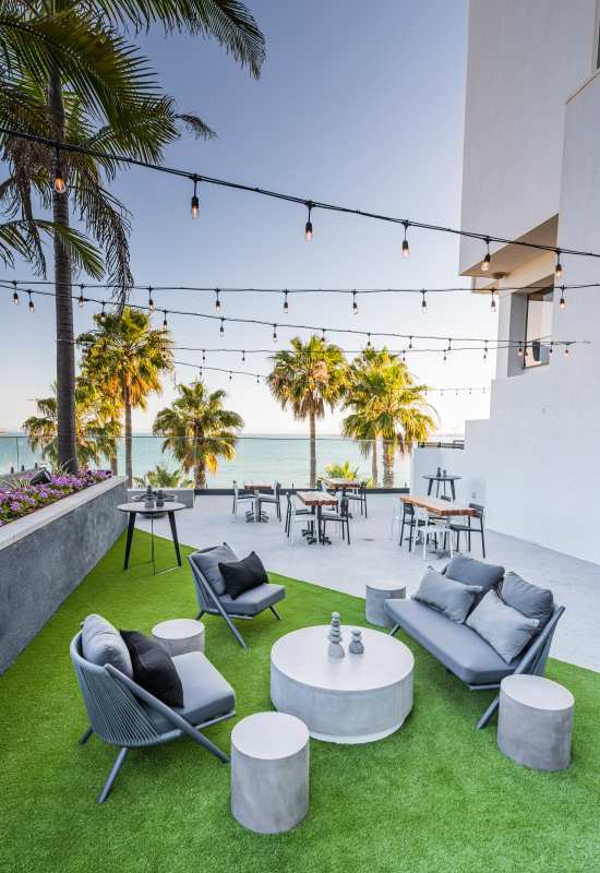 Outdoor sitting area at 1900 Ocean Apartment Homes in Long Beach, California