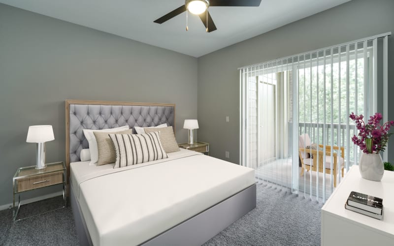 Spacious master bedroom with plush carpeting at The Grove at Orenco Station in Hillsboro, Oregon