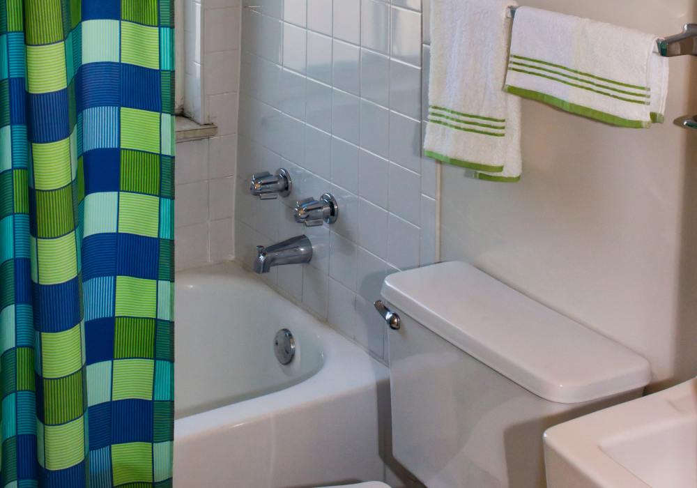 Bathroom with bath-tub at Pin Oak Manor Apartments in Mishawaka, Indiana