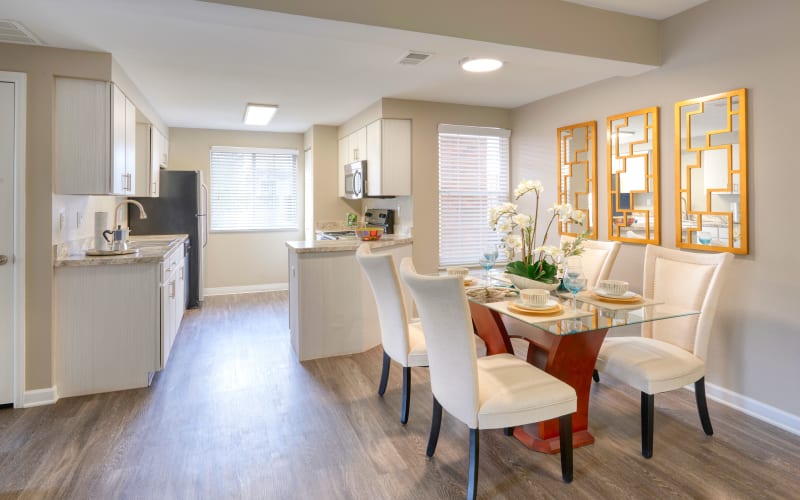 Renovated kitchen with light cabinets at Villas at Homestead Apartments in Englewood, Colorado