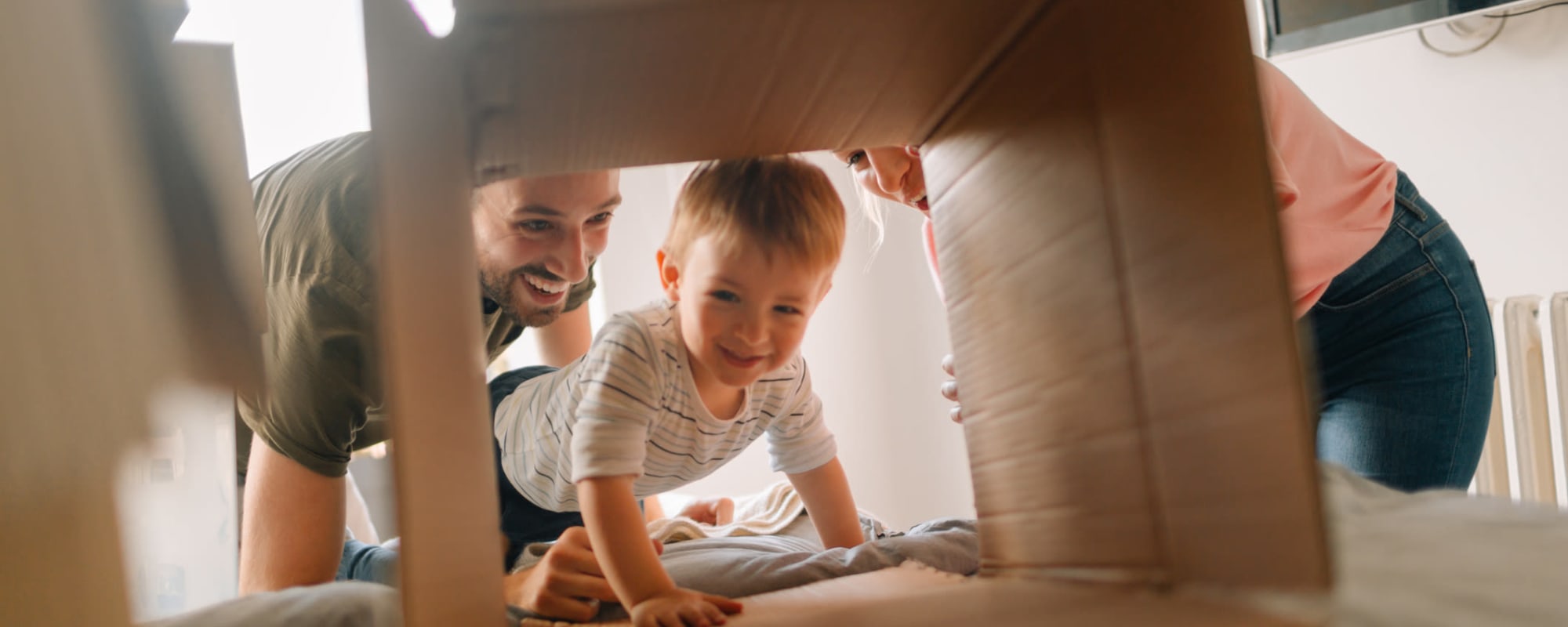 Kid and family playing with boxes at A3 Urban Storage in Dallas, Texas