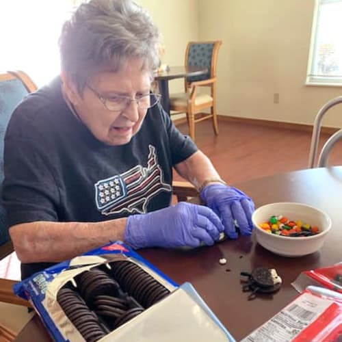 Resident making treats at Alderbrook Village in Arkansas City, Kansas