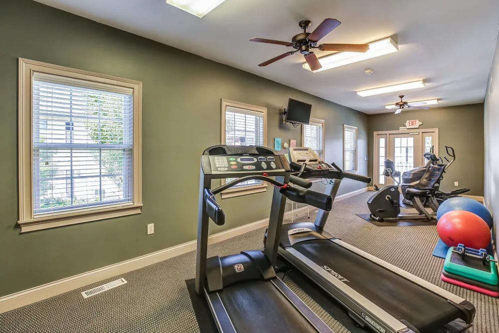 Get a workout at the fitness center at Reserve at Ft. Mitchell Apartments in Ft. Mitchell, Kentucky