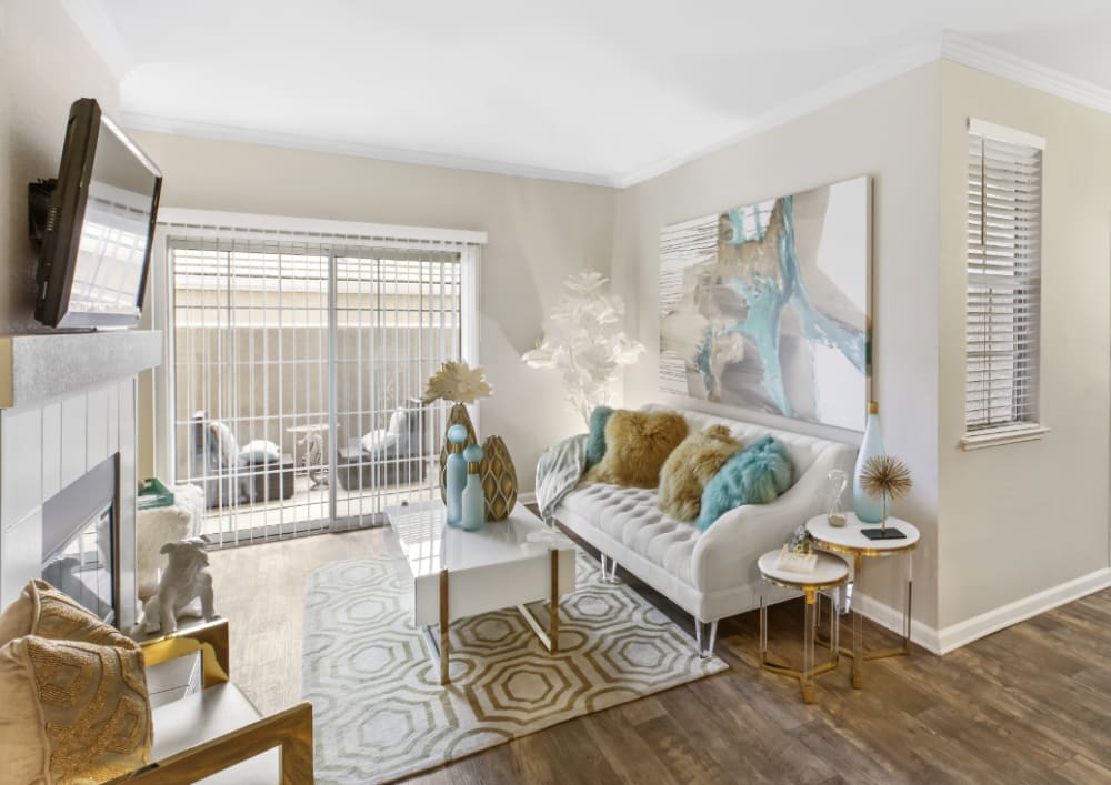 Living room with access to a private patio at Sherwood in Folsom, California