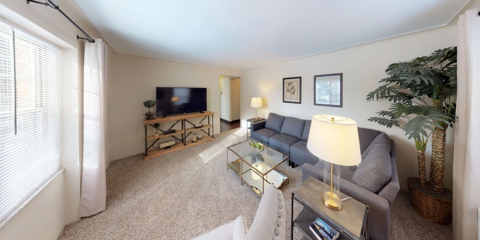 Model living room at Rugby Square Apartments in Syracuse, New York