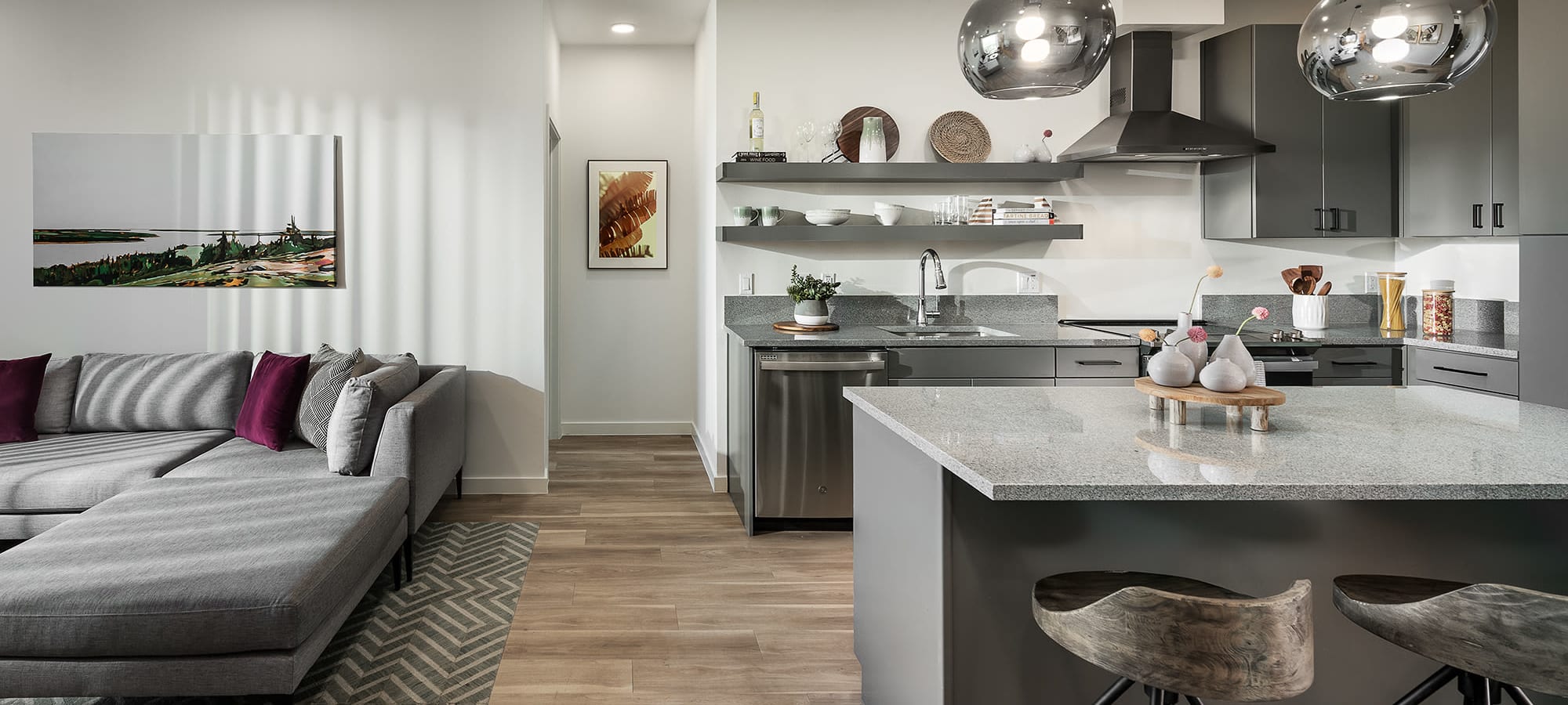 Gourmet kitchen leading to living room at The Piedmont in Tempe, Arizona