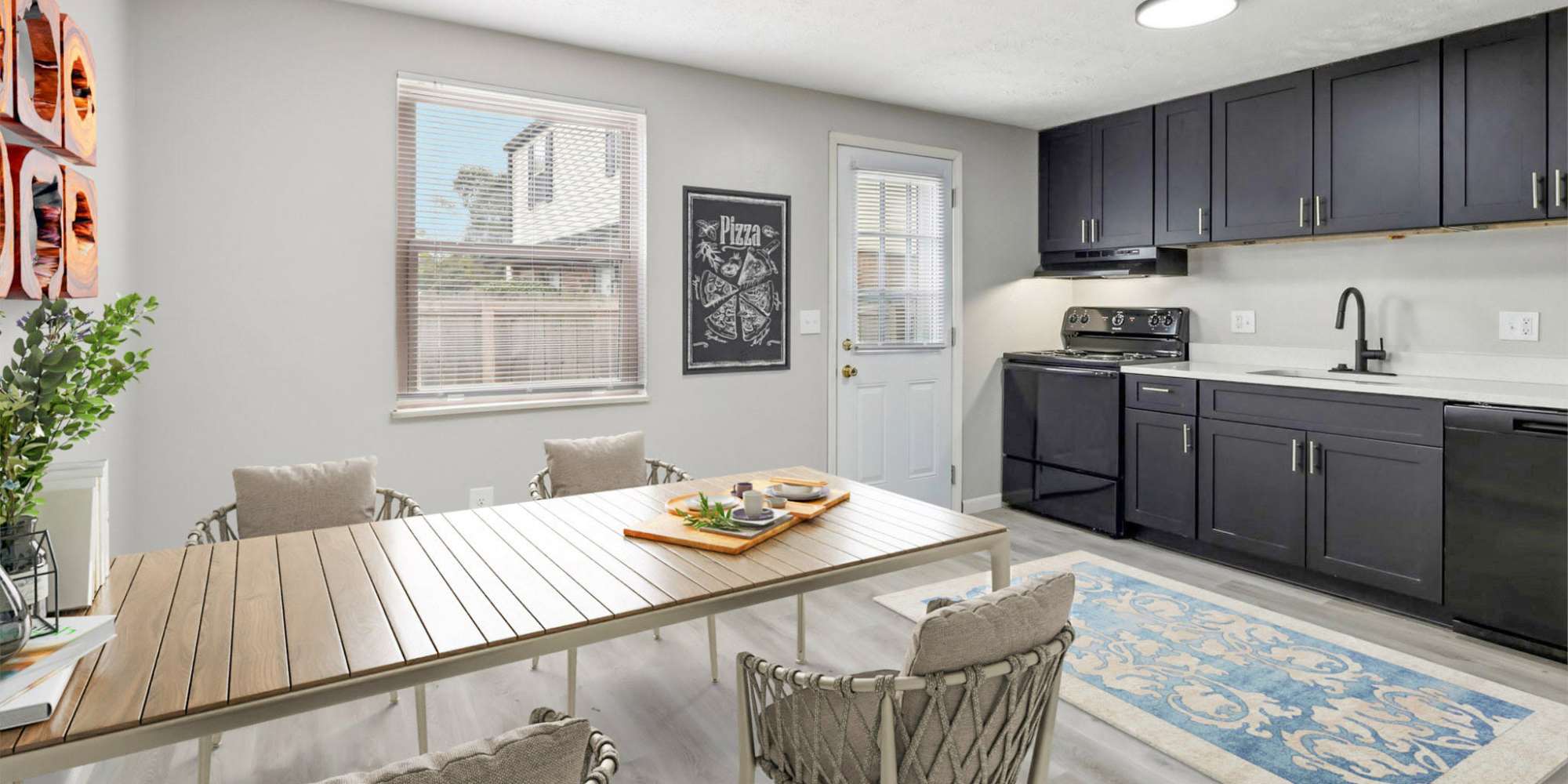 Kitchen and dining area at North Eden Townhomes in Columbus, Ohio