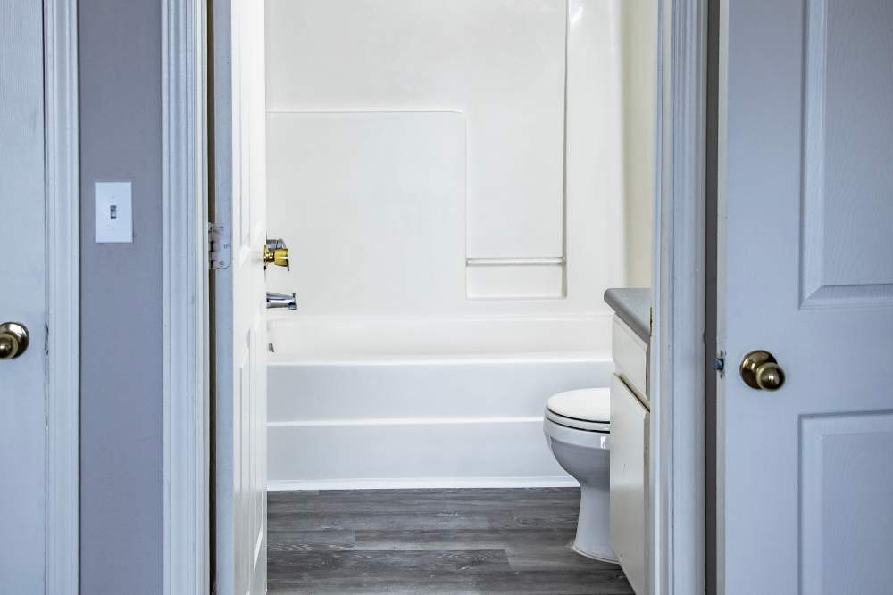 Bathtub in the bathroom at Whispering Plains Apartments in Guymon, Oklahoma