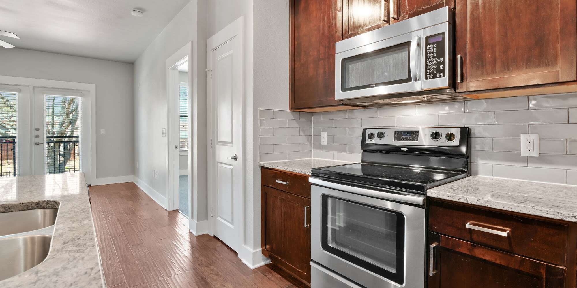 Kitchen with cabinetry at The Standard in Dallas, Texas