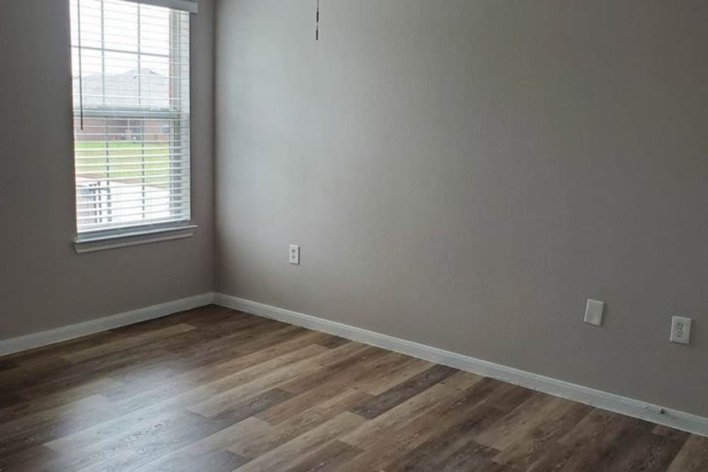 Bright bedroom at Autumn Brook Apartments in Chickasha, Oklahoma