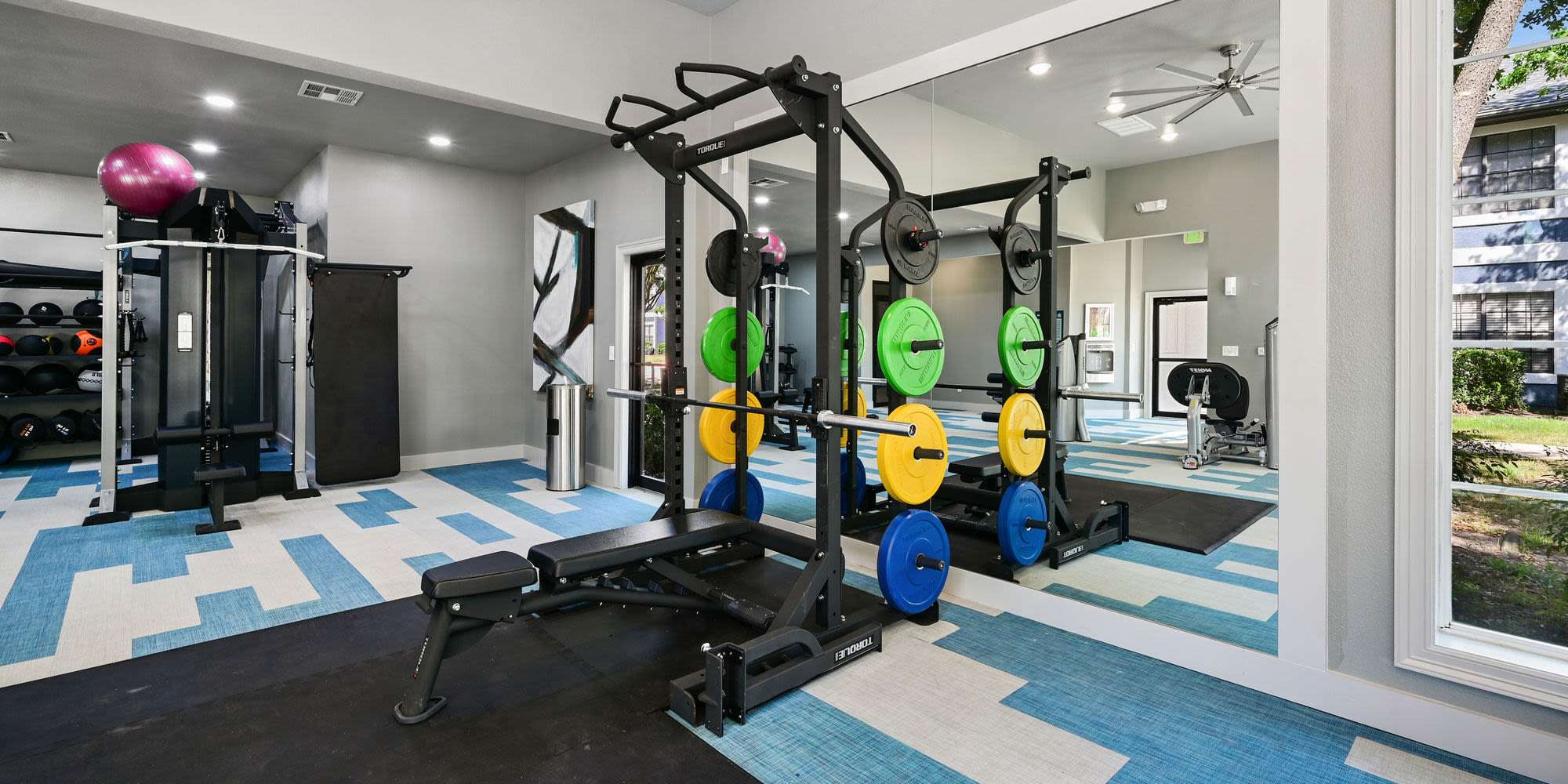 Well-equipped fitness center at Seacrest in Katy, Texas