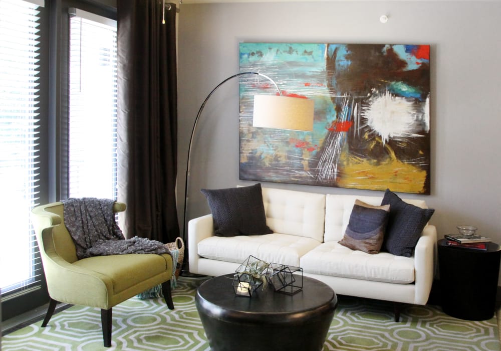 Enjoy a luxury living room at Axis at Wycliff in Dallas, Texas