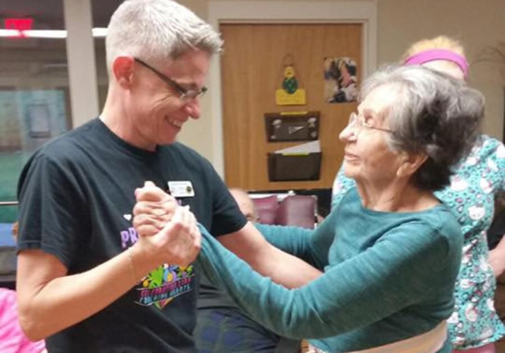 Resident dancing with a volunteer at Geneva Lake Manor in Lake Geneva, Wisconsin