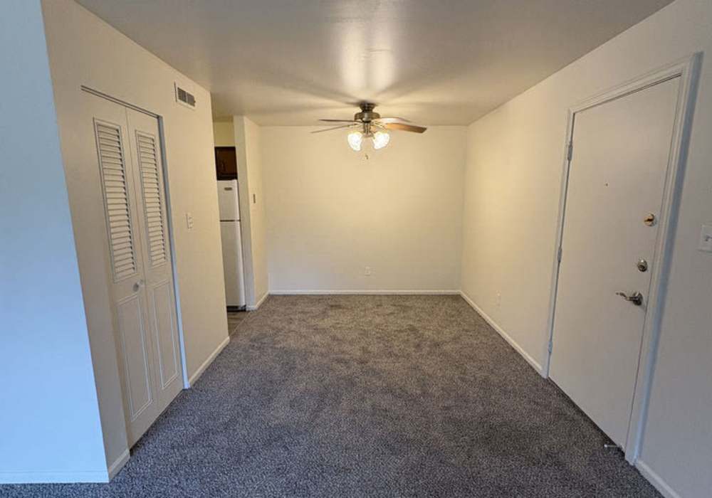 Open-concept of kitchen and living room at Mount Vernon Arms Apartments in Merrillville,Indiana