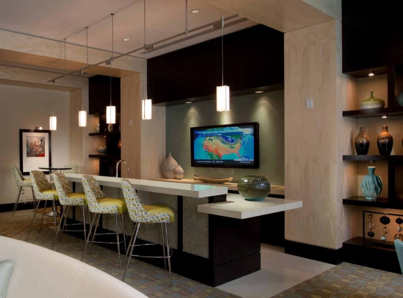Communal dining area with bar seating at Solaire 1150 Ripley in Silver Spring, Maryland